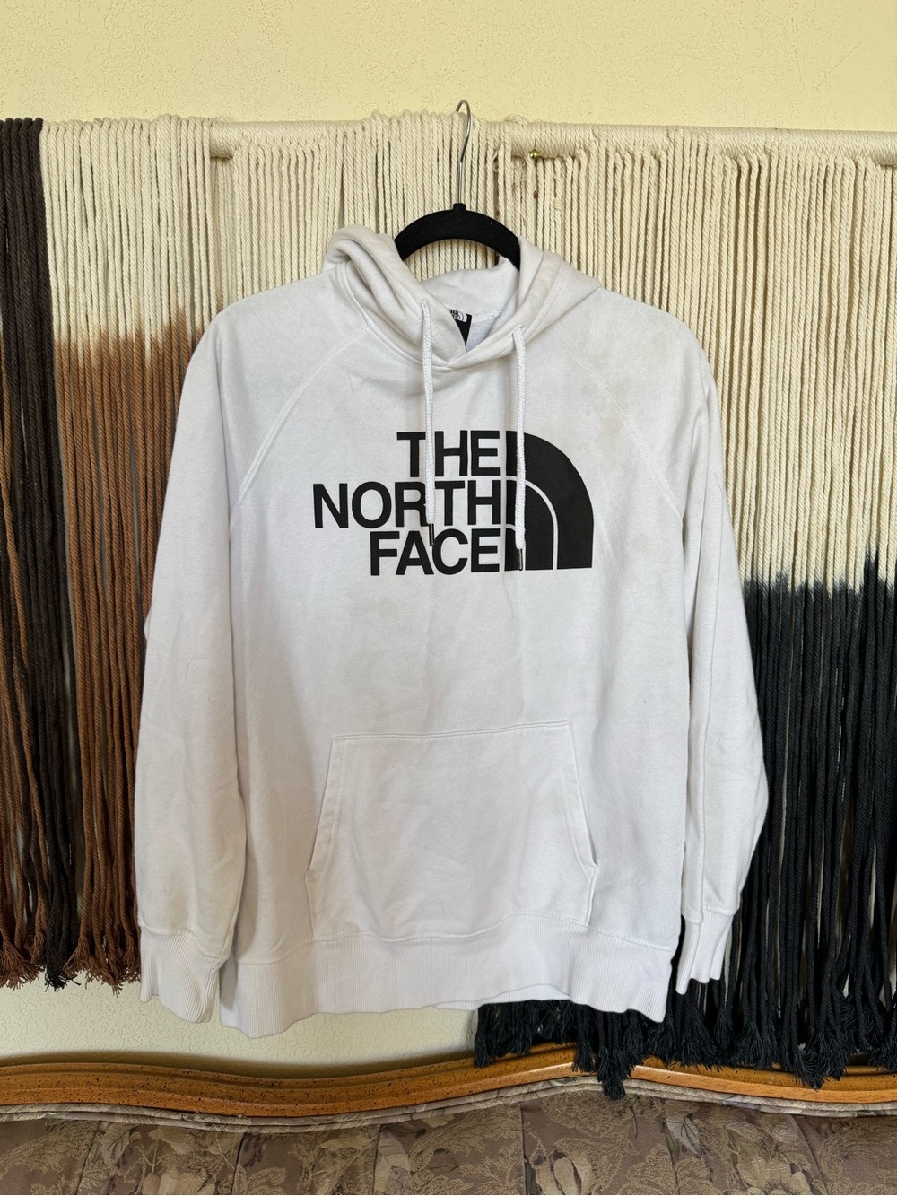 White The North Face hoodie; fair condition